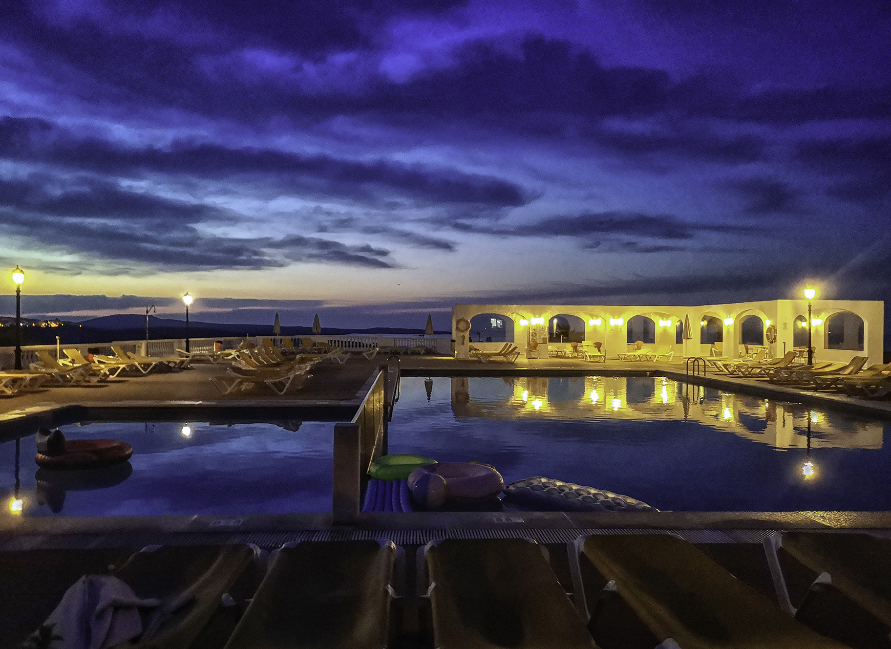 Menorca round the pool evening